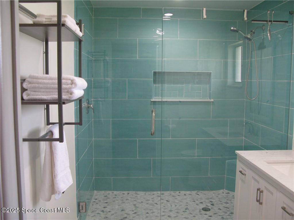 3700 Bay Street Sebastian, FL 32976 - Photo 16 of 34 a bathroom with a shower