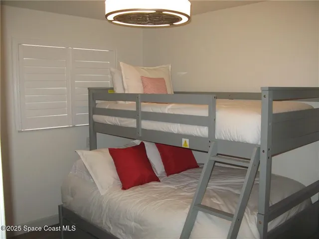 a view of a bedroom with a wardrobe