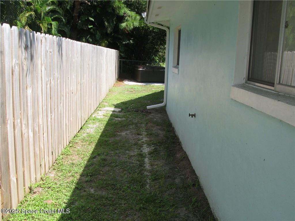 3700 Bay Street Sebastian, FL 32976 - Photo 33 of 34 a view of a pathway with a yard