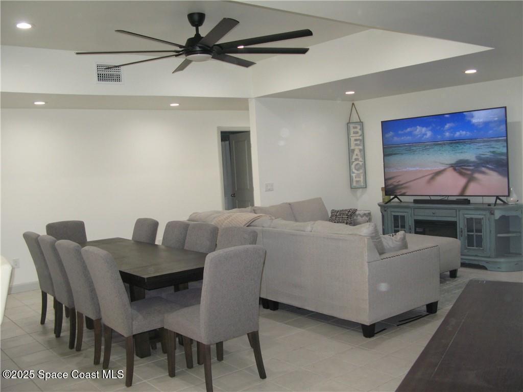 3700 Bay Street Sebastian, FL 32976 - Photo 4 of 34 a living room with furniture and a flat screen tv