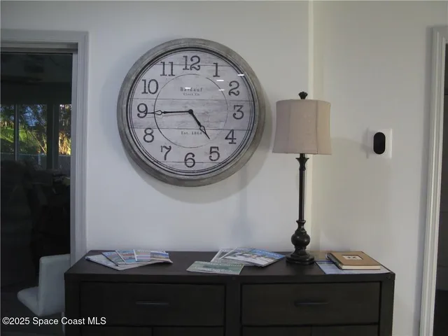 a table with a vase and a vase on it