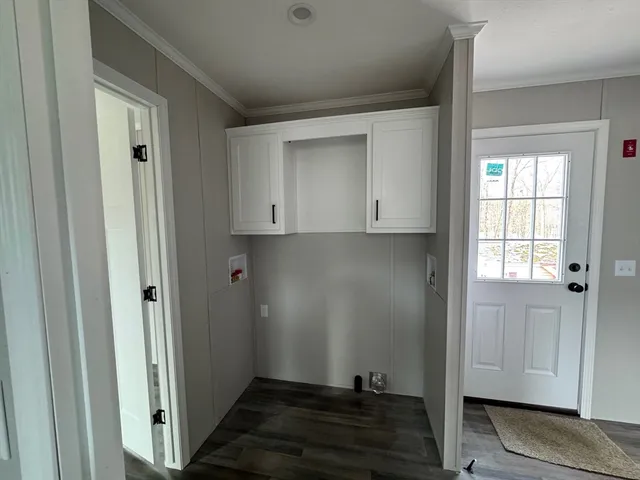 a view of bathroom with wooden floor