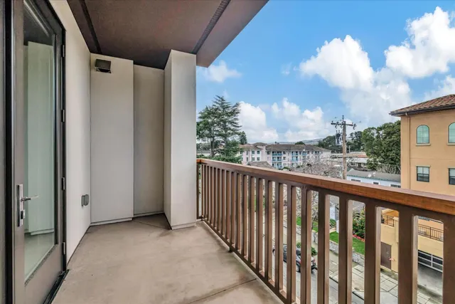 a kitchen with a stove sink and refrigerator