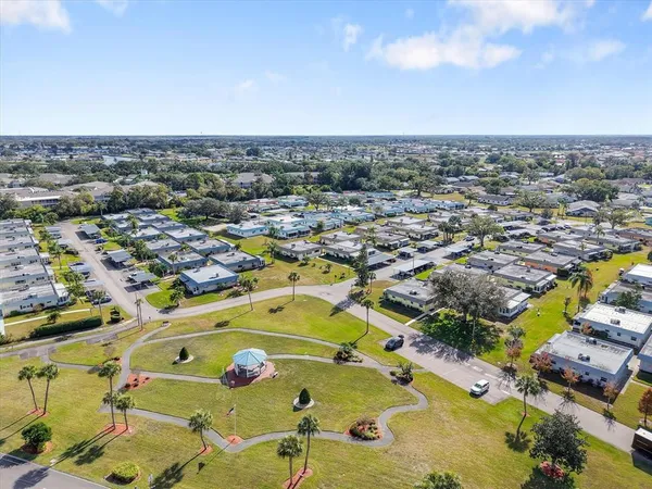 an aerial view of residential house with outdoor space