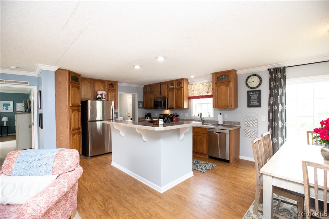 2862 Stage Coach Road Farmville, VA 23901 - Photo 20 of 48 a kitchen with cabinets and wooden floor
