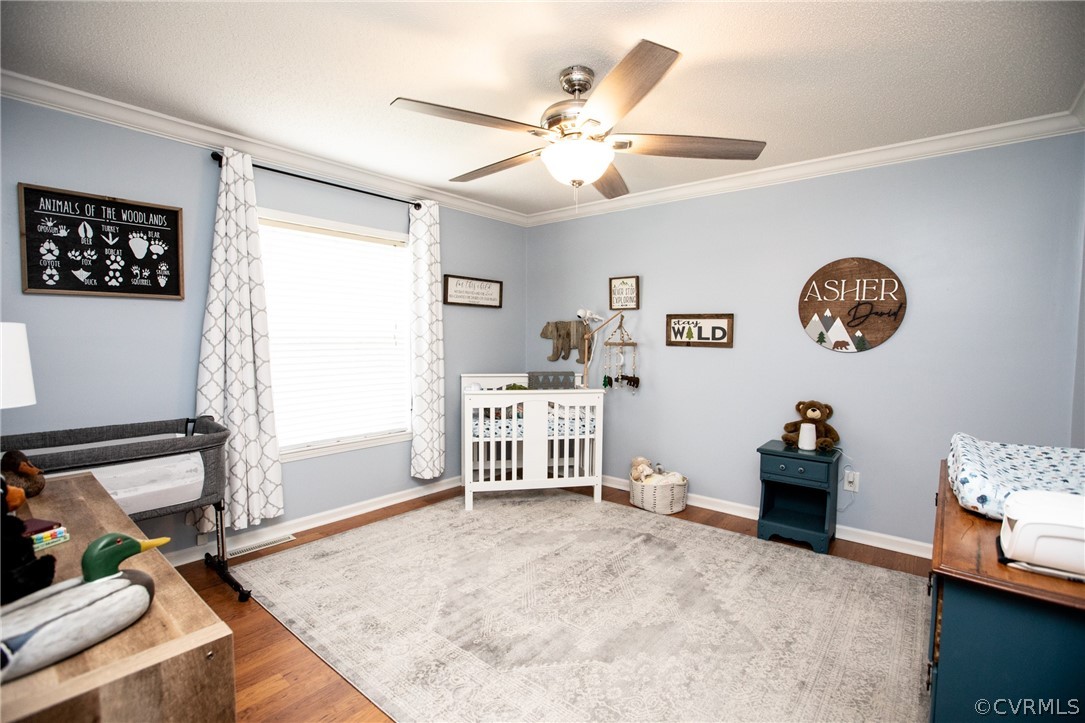 2862 Stage Coach Road Farmville, VA 23901 - Photo 27 of 48 a bedroom with a bed and a large window