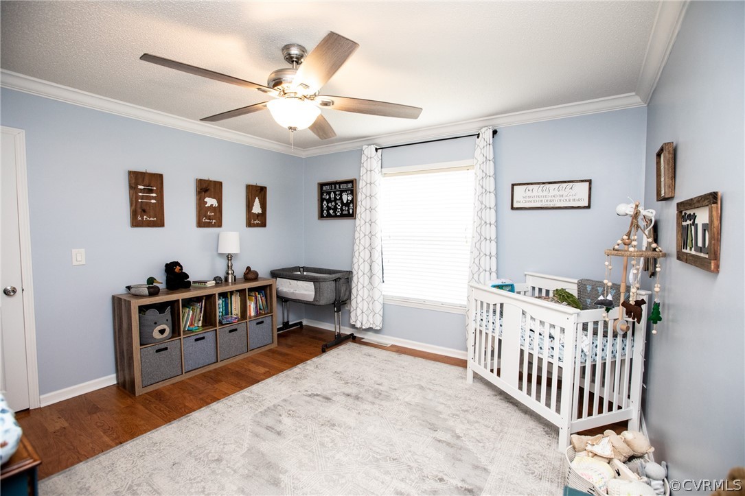 2862 Stage Coach Road Farmville, VA 23901 - Photo 29 of 48 a bedroom with furniture a bed and a chandelier