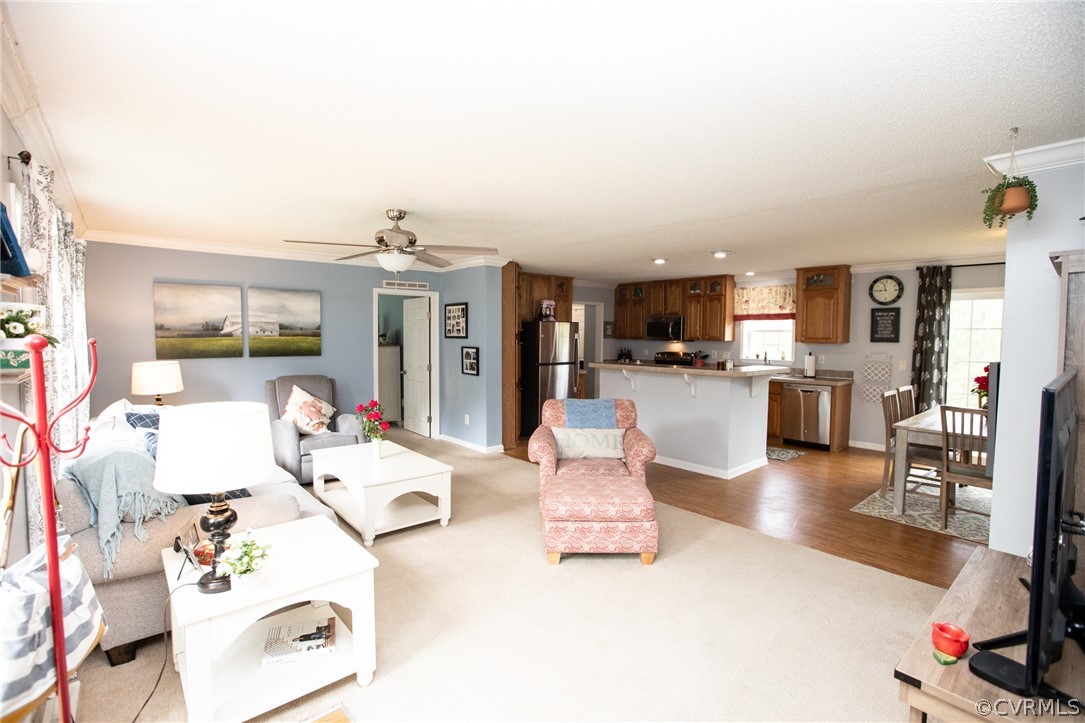 2862 Stage Coach Road Farmville, VA 23901 - Photo 3 of 48 a living room with furniture and a flat screen tv