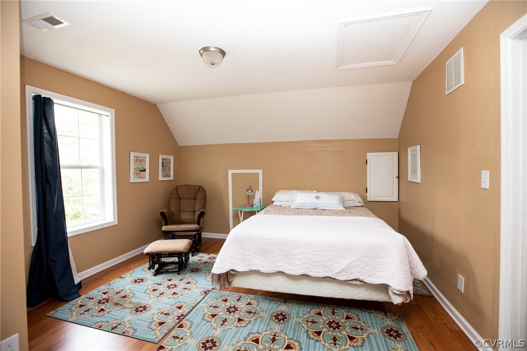2862 Stage Coach Road Farmville, VA 23901 - Photo 38 of 48 a bedroom with a bed chair and a window