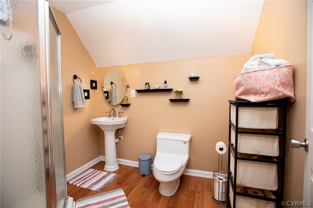 2862 Stage Coach Road Farmville, VA 23901 - Photo 40 of 48 a bathroom with a toilet sink and mirror