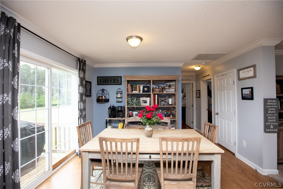 2862 Stage Coach Road Farmville, VA 23901 - Photo 10 of 48 a view of a dining room with furniture window and outside view