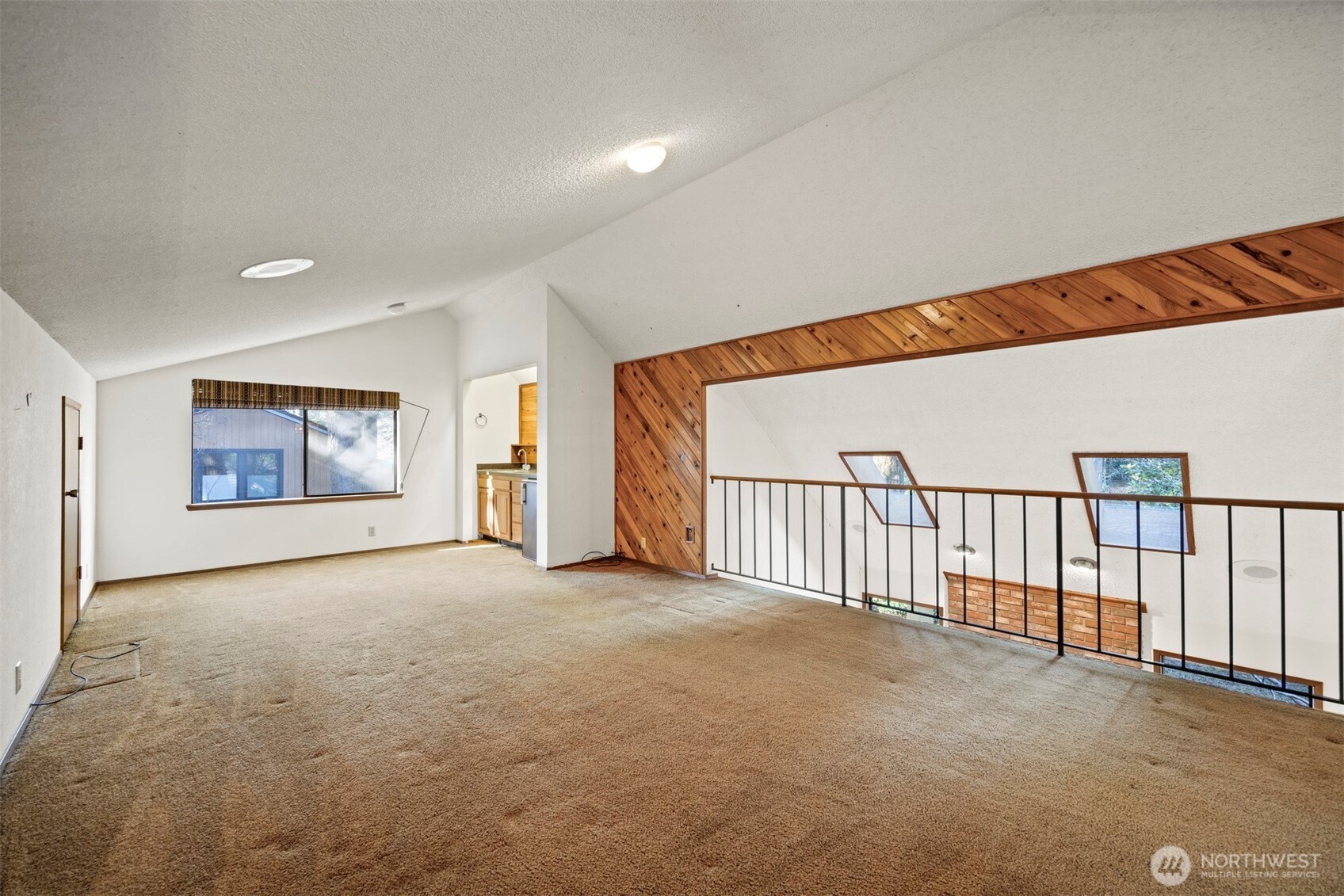 413 Viewcrest Road Bellingham, WA 98229 - Photo 25 of 40 a view of a big room with windows