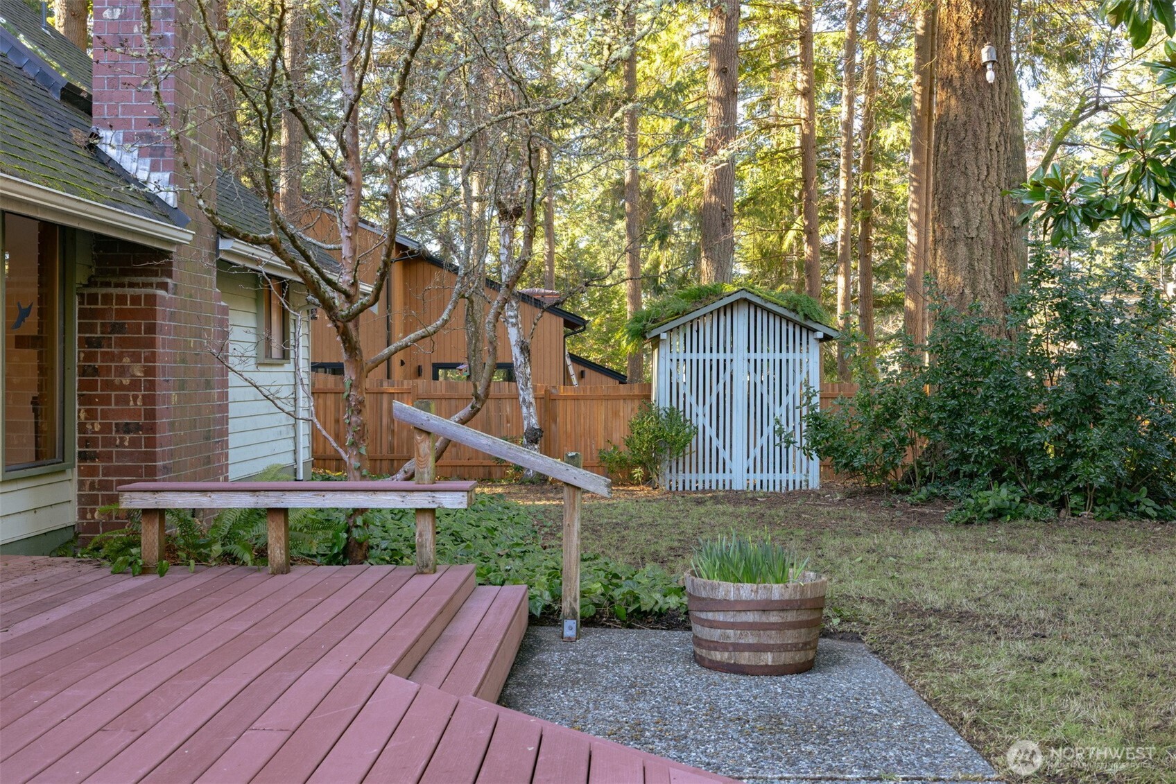 413 Viewcrest Road Bellingham, WA 98229 - Photo 30 of 40 a wooden bench sitting in front of a house