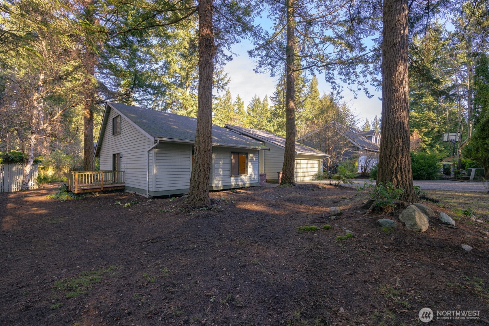 413 Viewcrest Road Bellingham, WA 98229 - Photo 37 of 40 a view of a house with backyard and trees