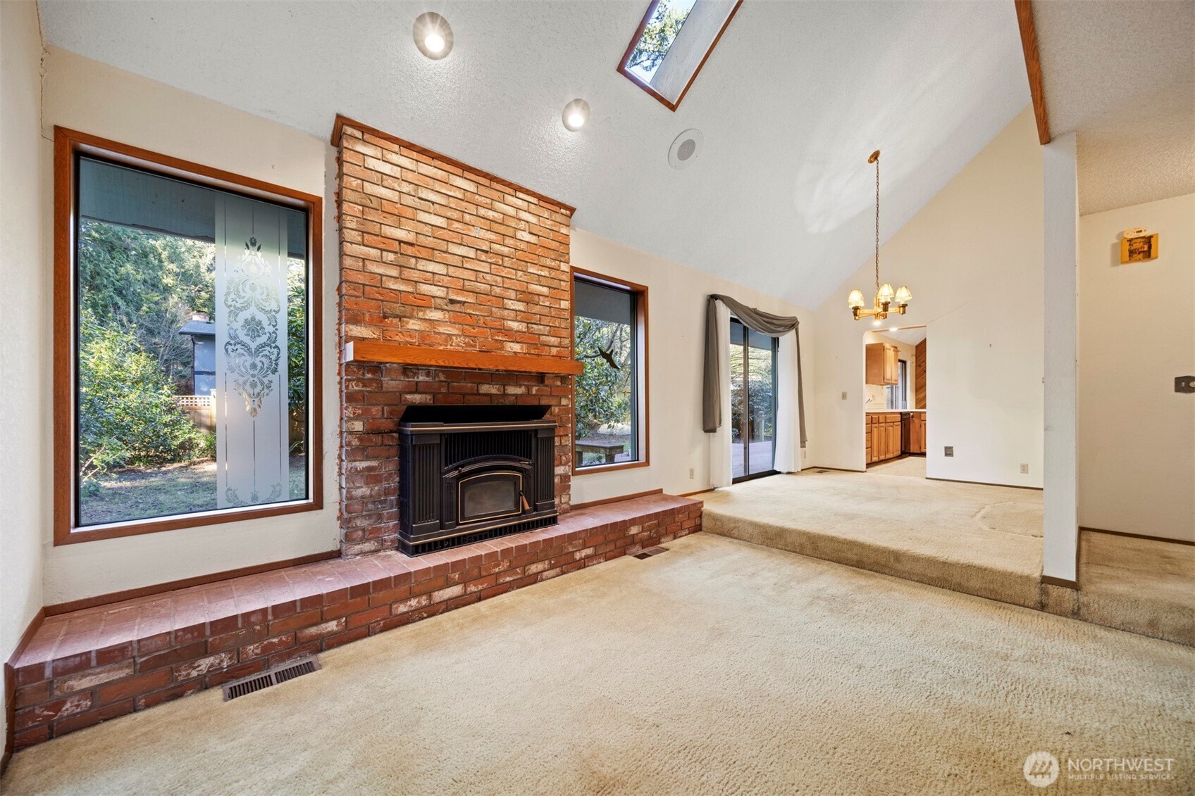 413 Viewcrest Road Bellingham, WA 98229 - Photo 7 of 40 a view of livingroom with fireplace window and furniture