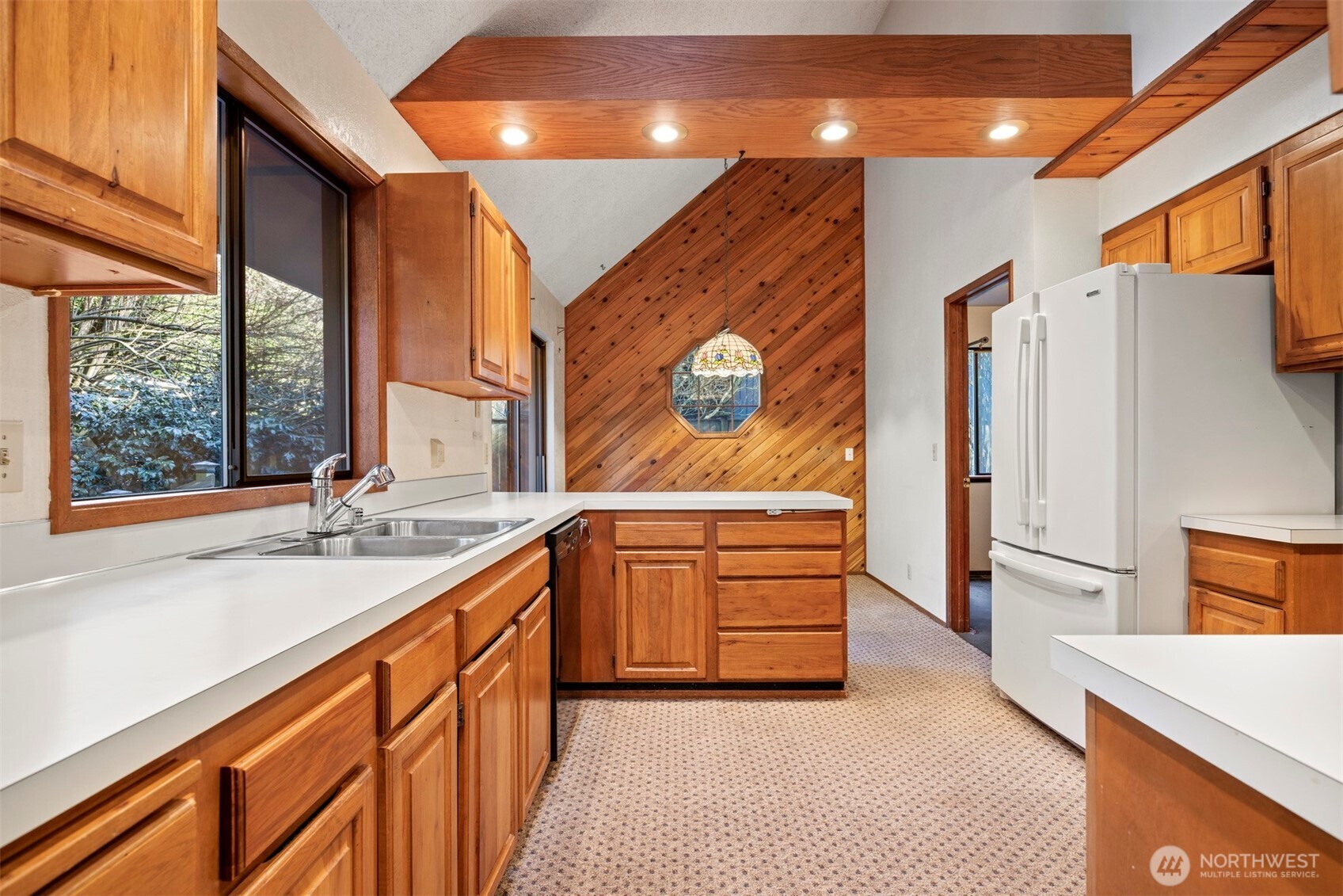 413 Viewcrest Road Bellingham, WA 98229 - Photo 9 of 40 a bathroom with a sink a vanity and a large mirror