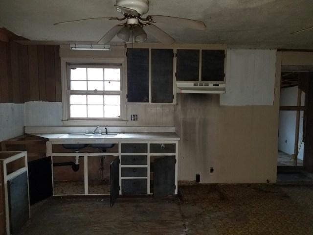 2002 Kemp Ford Road Union Hall, VA 24176 - Photo 2 of 6 a kitchen with a stove and a microwave