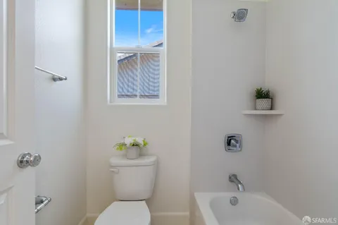 a workspace with furniture and a window