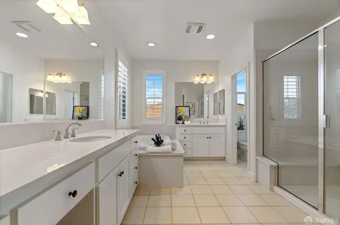 a bathroom with a bathtub and a sink