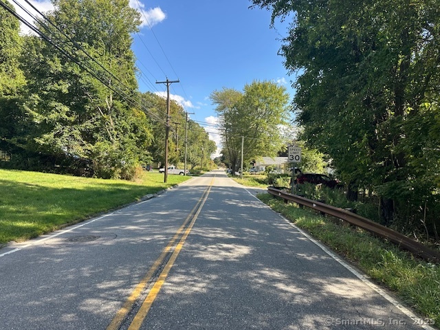 87 Fort Shantok Road Montville, CT 06382 - Photo 7 of 7 a view of a park with large trees