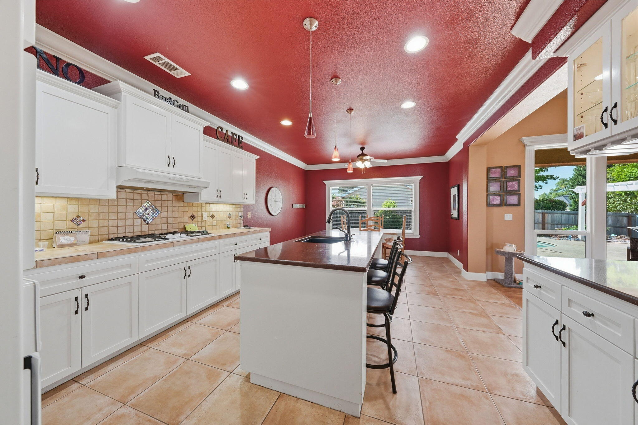 2175 Tradition Way Redding, CA 96001 - Photo 12 of 36 a kitchen with granite countertop a sink and cabinets
