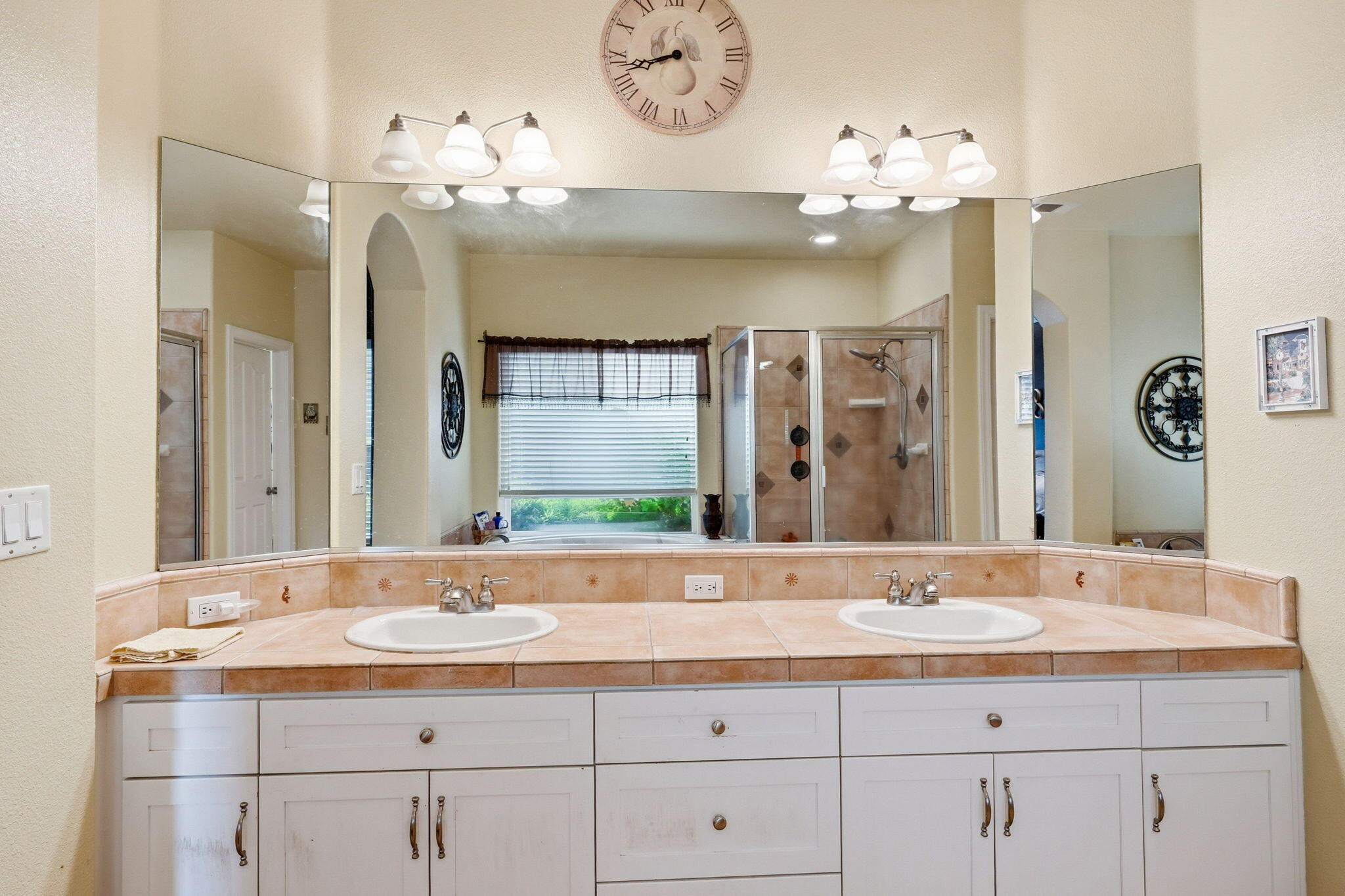 2175 Tradition Way Redding, CA 96001 - Photo 17 of 36 a bathroom with a sink vanity and a mirror