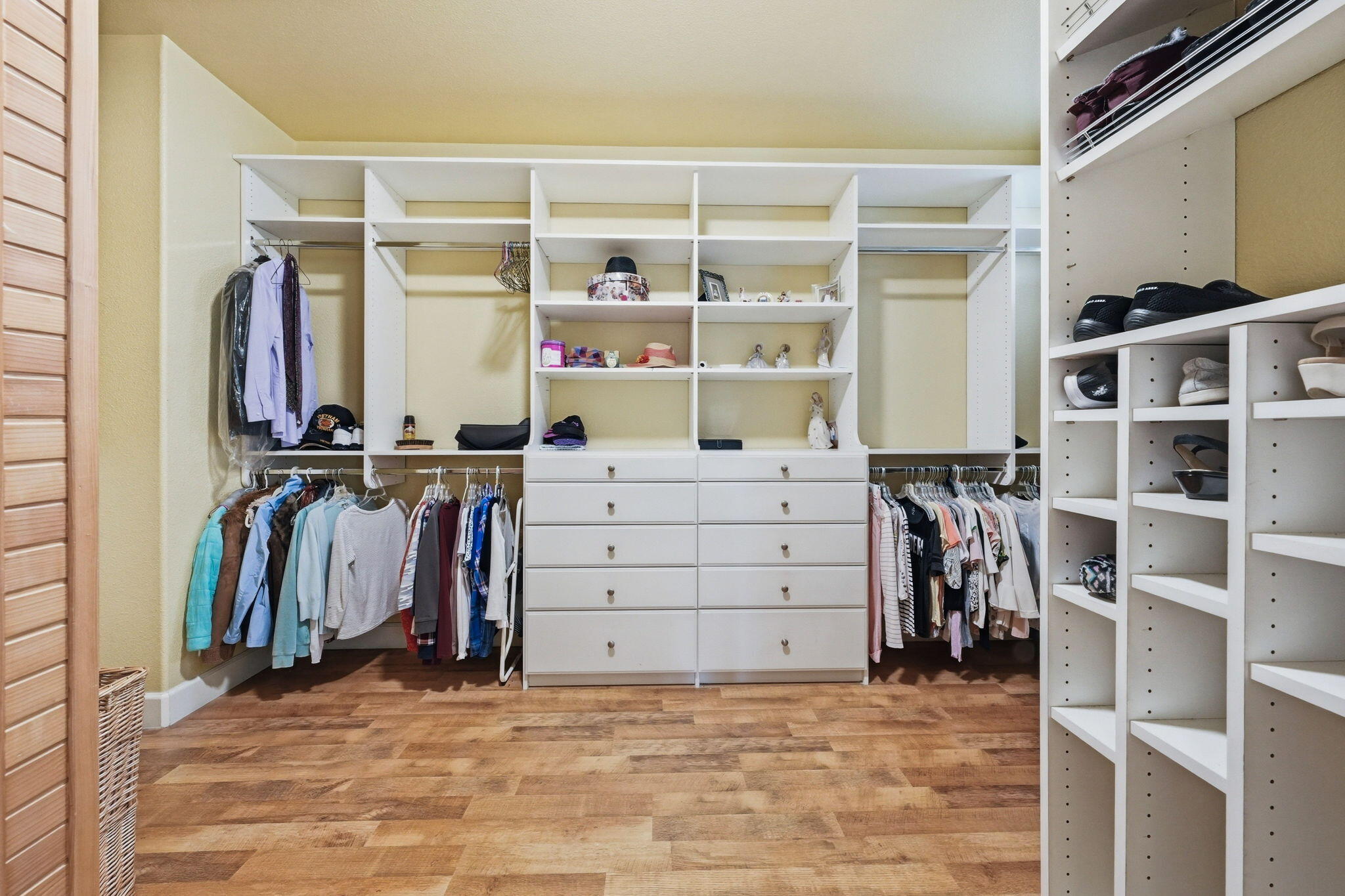 2175 Tradition Way Redding, CA 96001 - Photo 21 of 36 a view of walk in closet with clothes and shoes