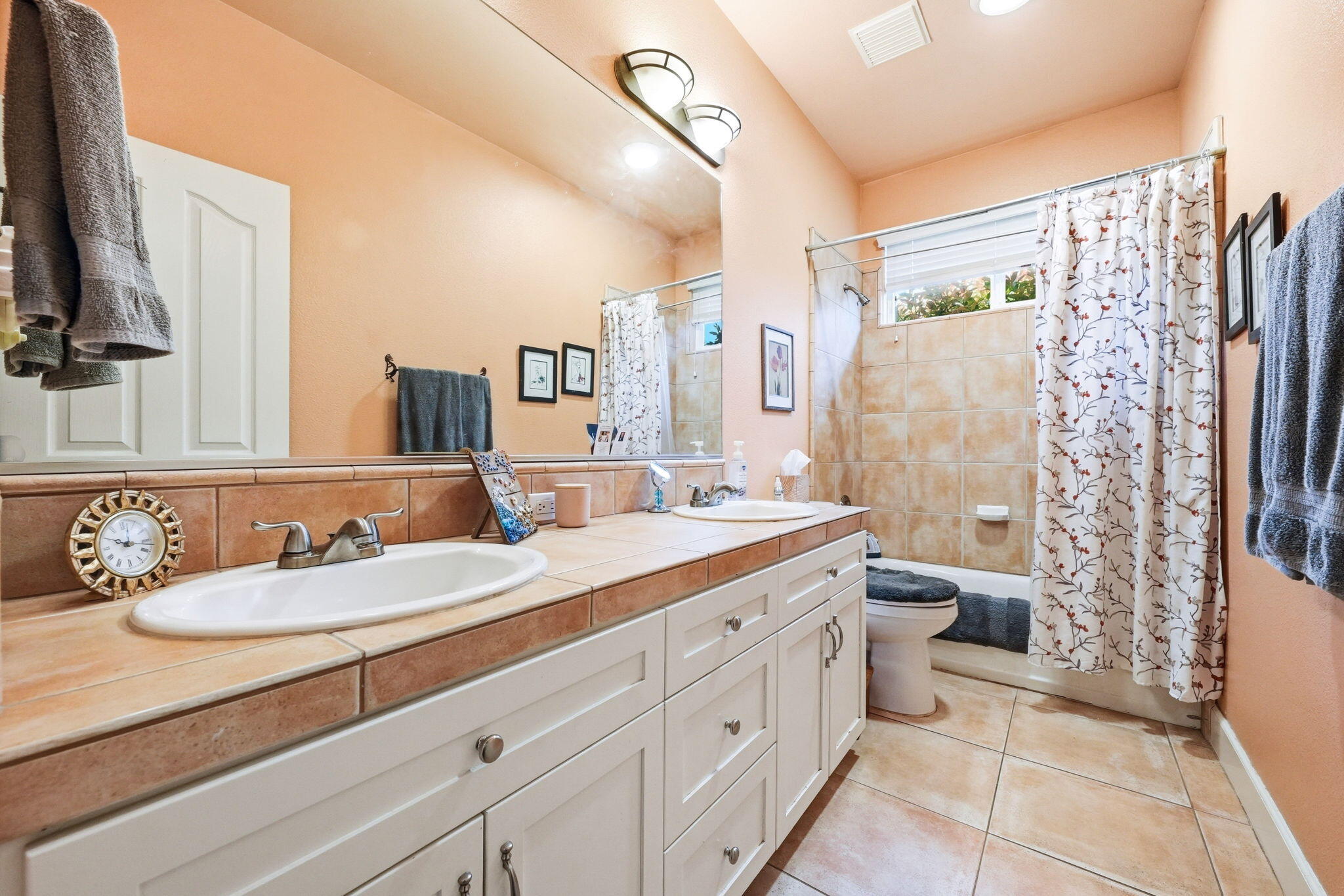2175 Tradition Way Redding, CA 96001 - Photo 25 of 36 a spacious bathroom with a double vanity sink toilet mirror and shower