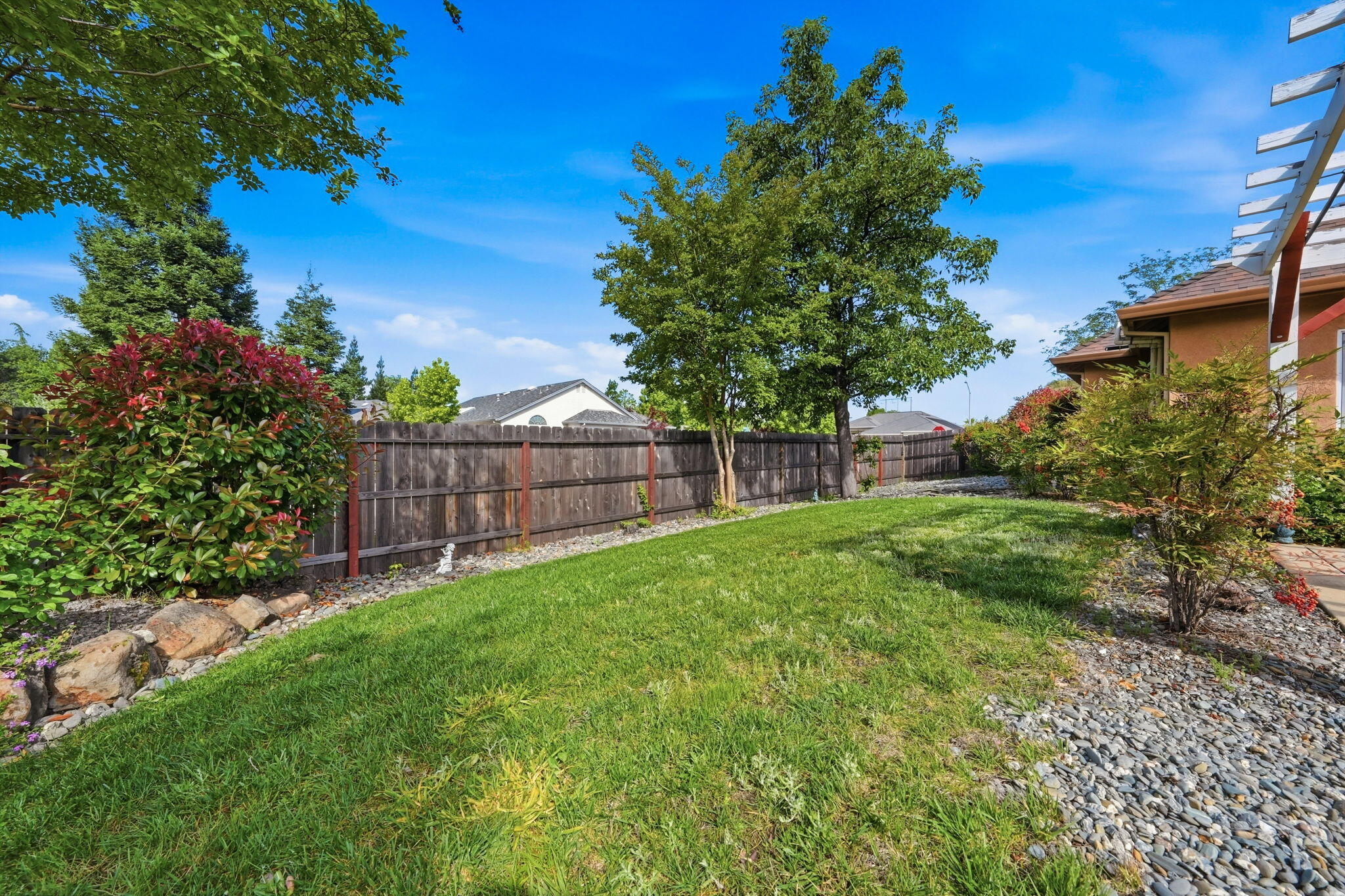 2175 Tradition Way Redding, CA 96001 - Photo 31 of 36 a view of a backyard with a tree
