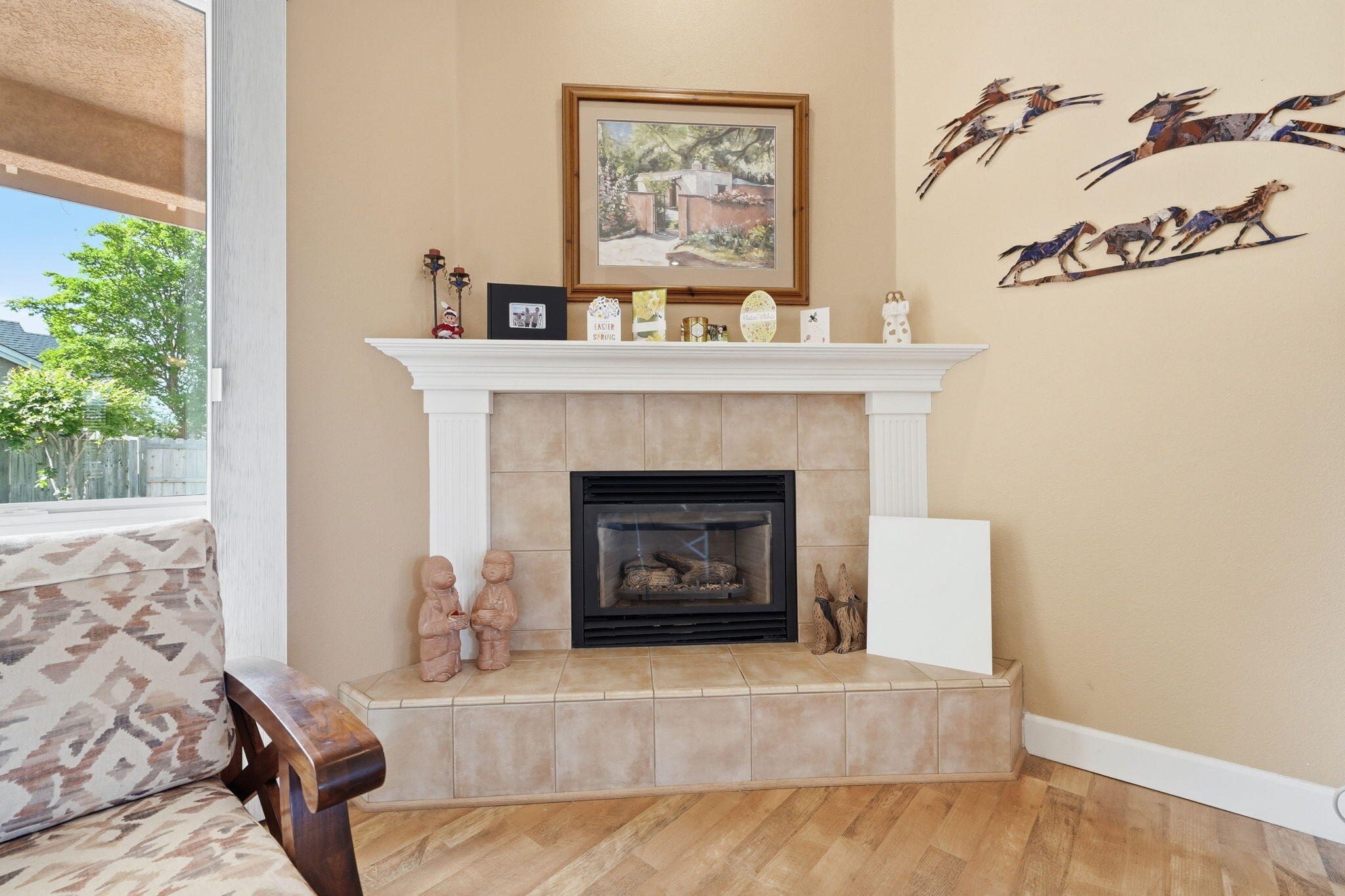 2175 Tradition Way Redding, CA 96001 - Photo 6 of 36 a living room with furniture and a fireplace
