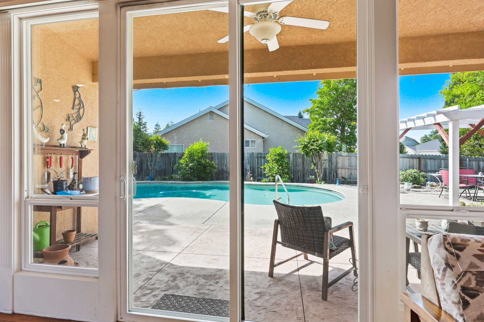 2175 Tradition Way Redding, CA 96001 - Photo 7 of 36 a view of a porch with chairs and backyard