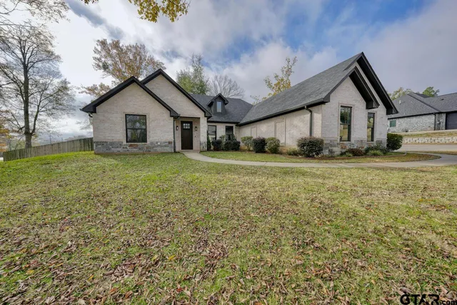 a house view with a garden space