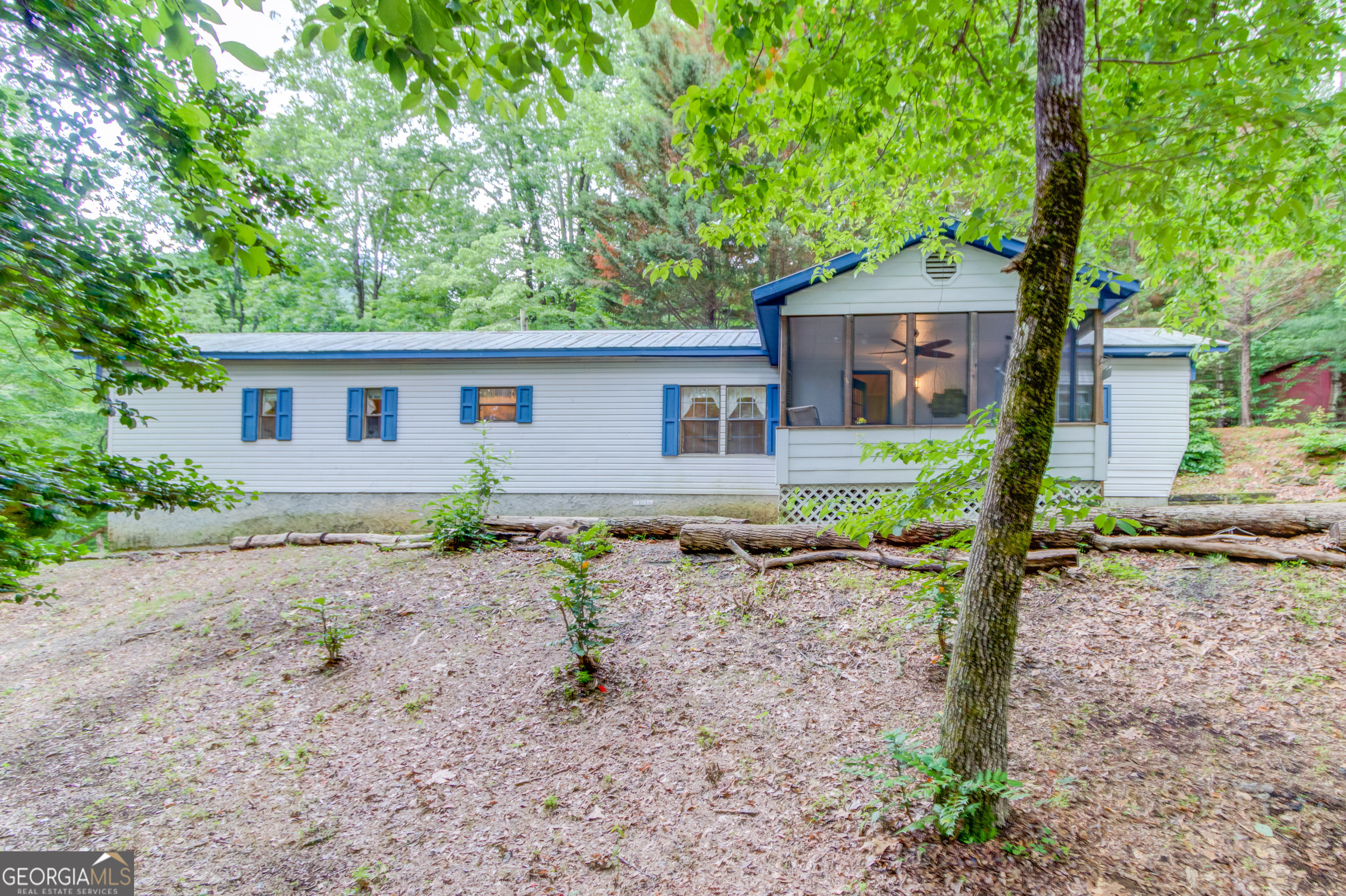 4669 Jones Gap Road Hiawassee, GA 30546 - Photo 1 of 1 a house with a outdoor space
