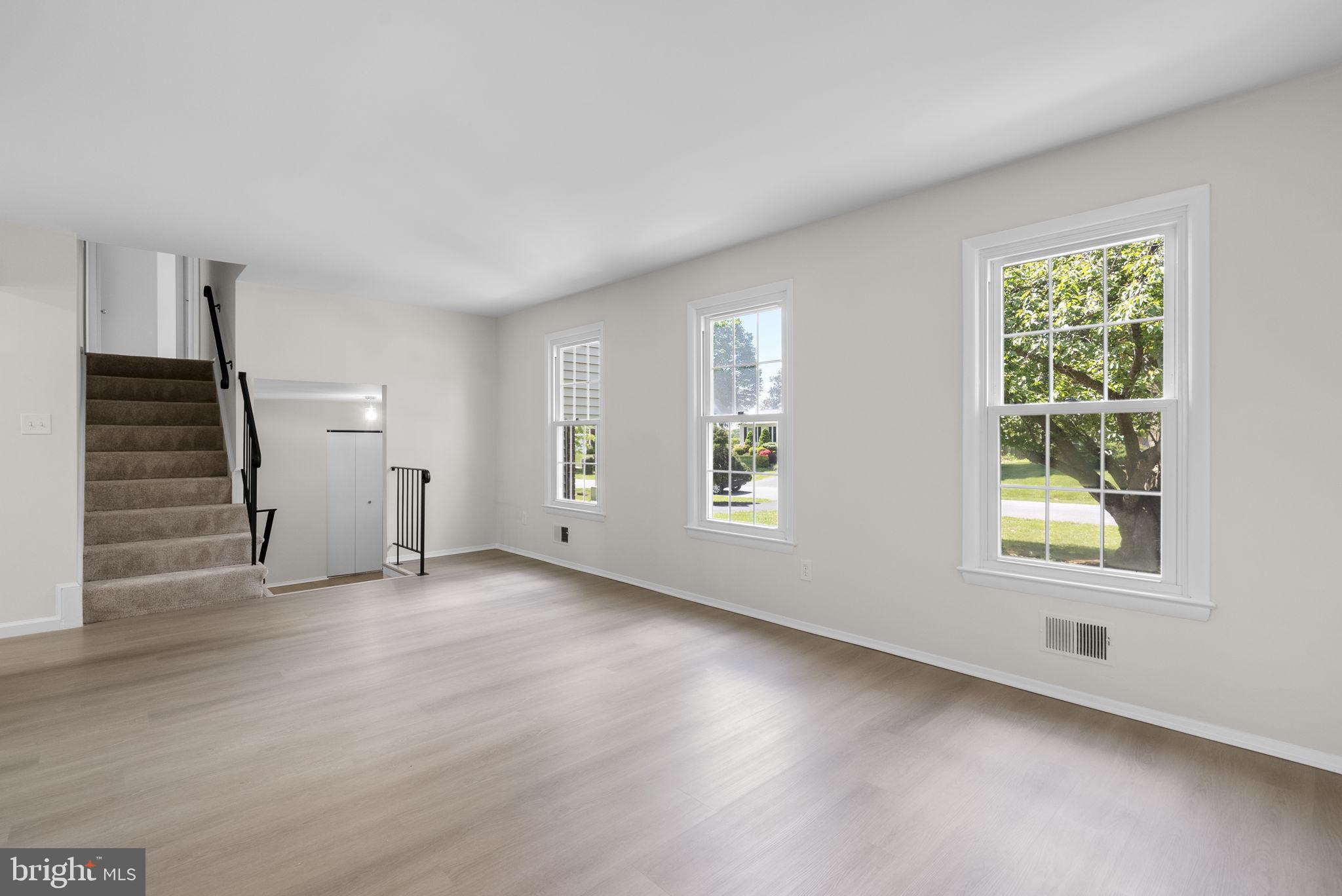 17109 Oxley Farm Road Poolesville, MD 20837 - Photo 3 of 43 Living room with new LVP floors + freshly painted