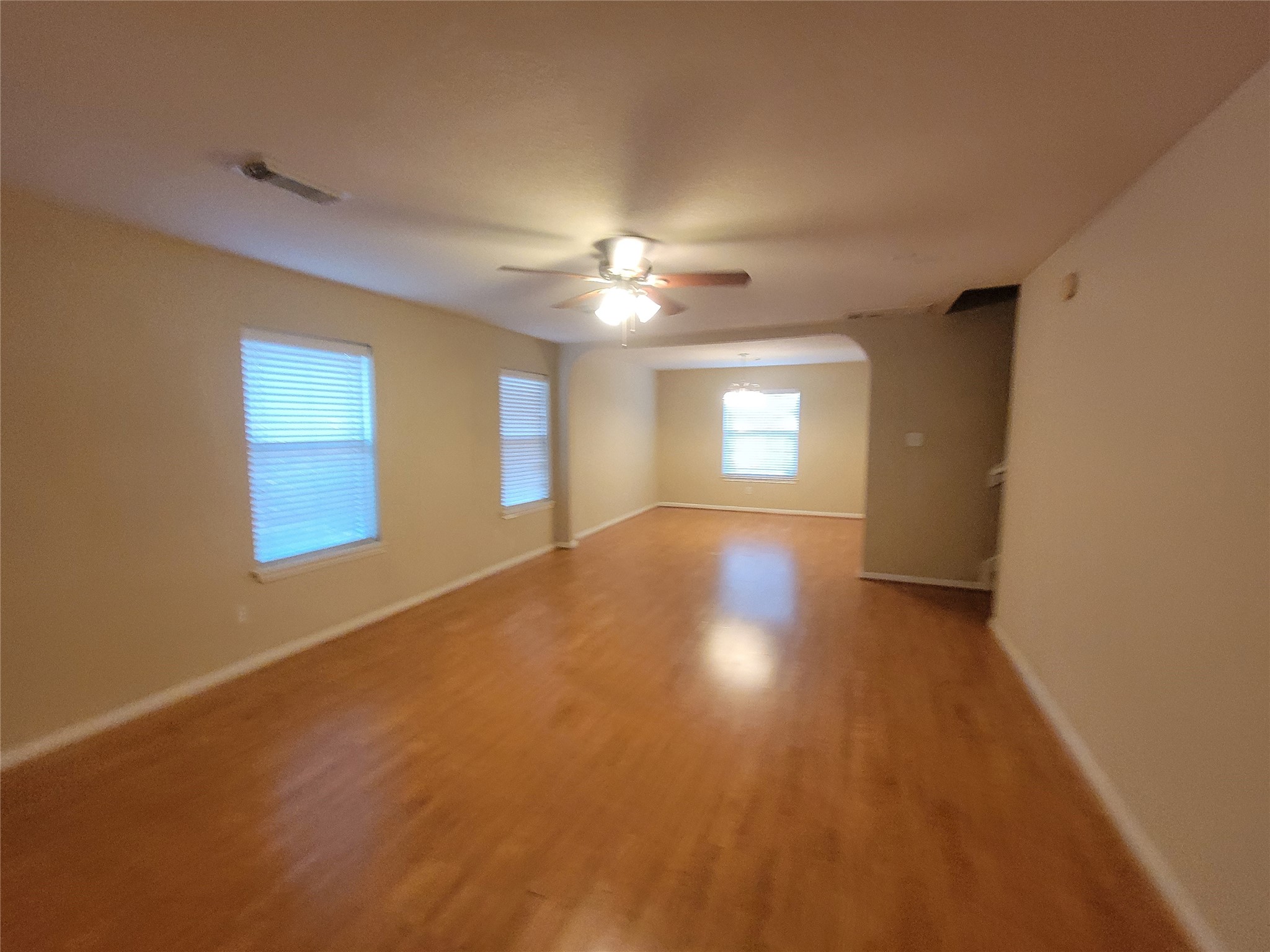 2414 Gwenfair Drive Spring, TX 77373 - Photo 6 of 35 Experience seamless flow from the spacious living room to the inviting breakfast area.