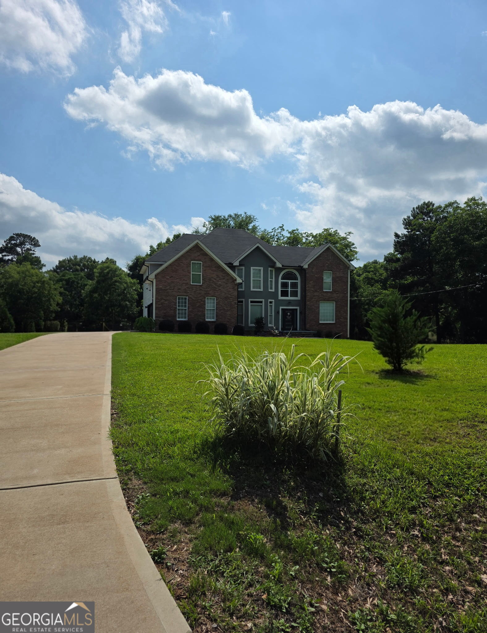 892 Perimeter Road Monticello, GA 31064 - Photo 36 of 38 a view of a garden with houses