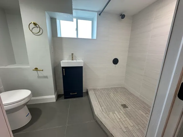 a bathroom with a sink and a toilet