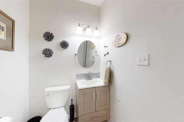 a spacious bathroom with a double vanity sink a mirror and a shower