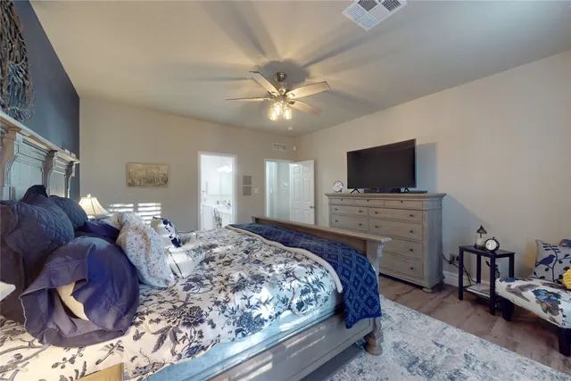 a living room with furniture toys and a flat screen tv