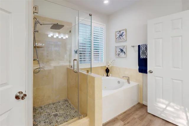 a bedroom with furniture and a book shelf