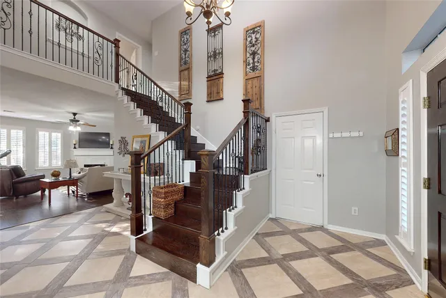 a view of entryway and hall with dining room