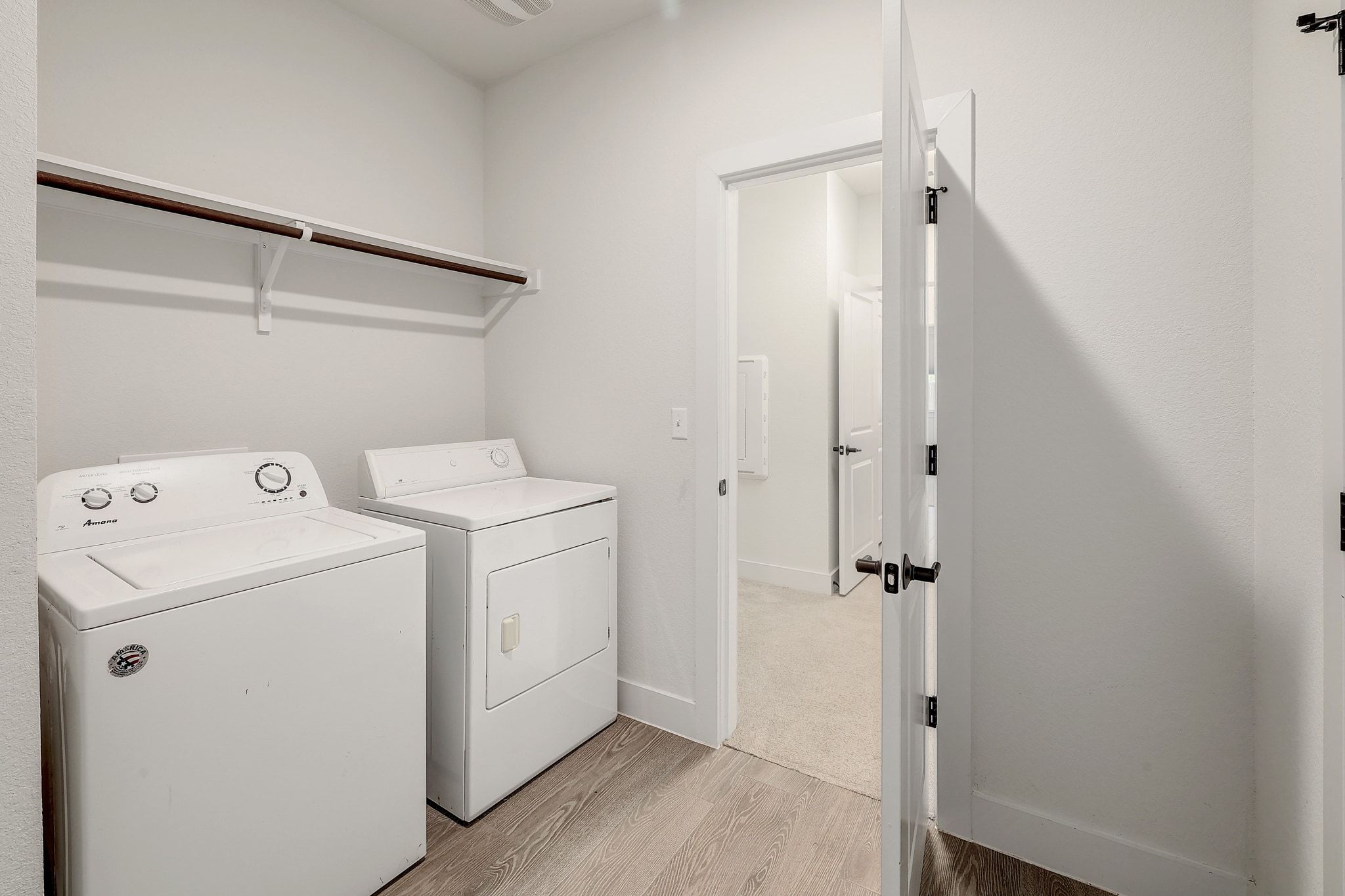 6111 Dunfries Lane Austin, TX 78744 - Photo 18 of 30 a view of bathroom with a washer and dryer