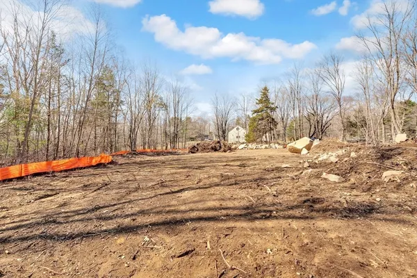 a view of snow on a road