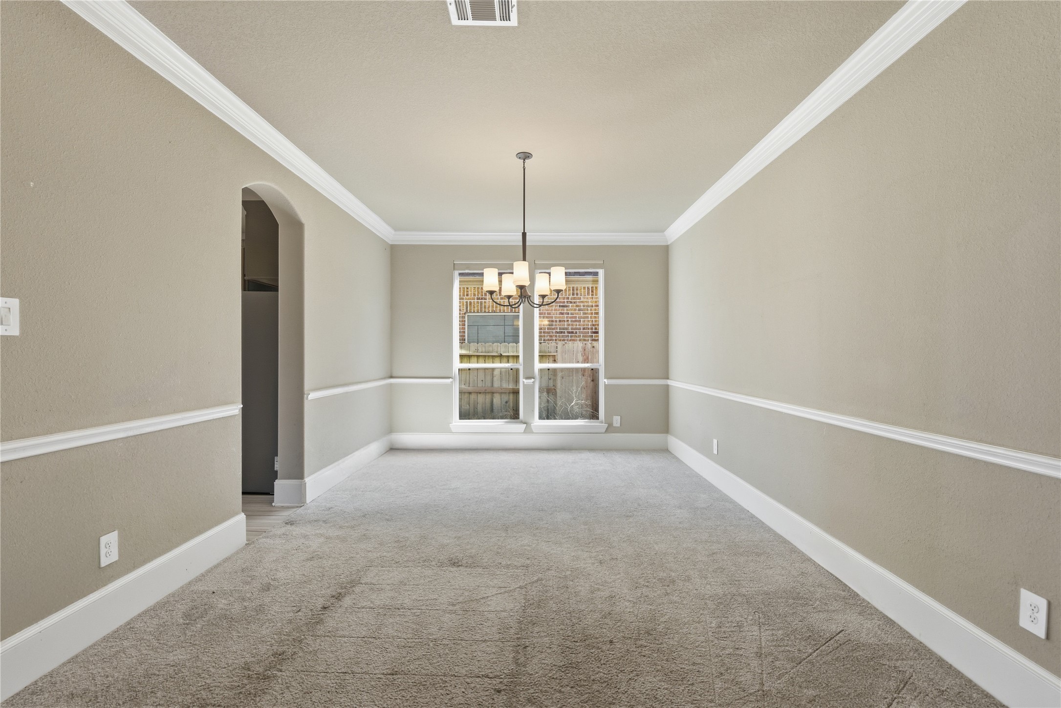 17501 Spice Merlot Lane Conroe, TX 77302 - Photo 12 of 50 a view of an empty room with a window