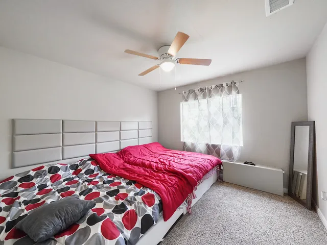 a bathroom with a toilet a sink and a shower
