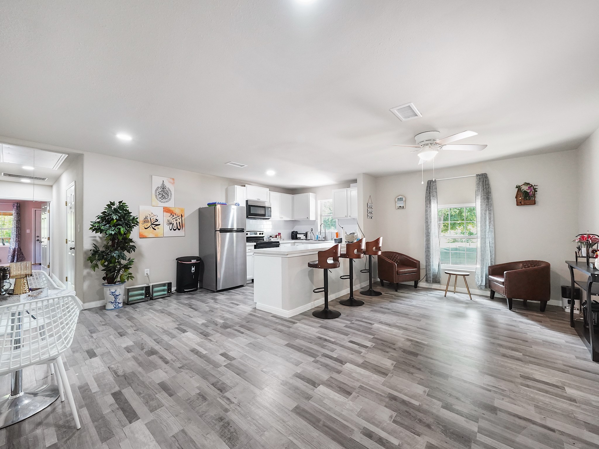 29 County Road 2131, Unit A Cleveland, TX 77327 - Photo 7 of 24 a view of a room with furniture and a window