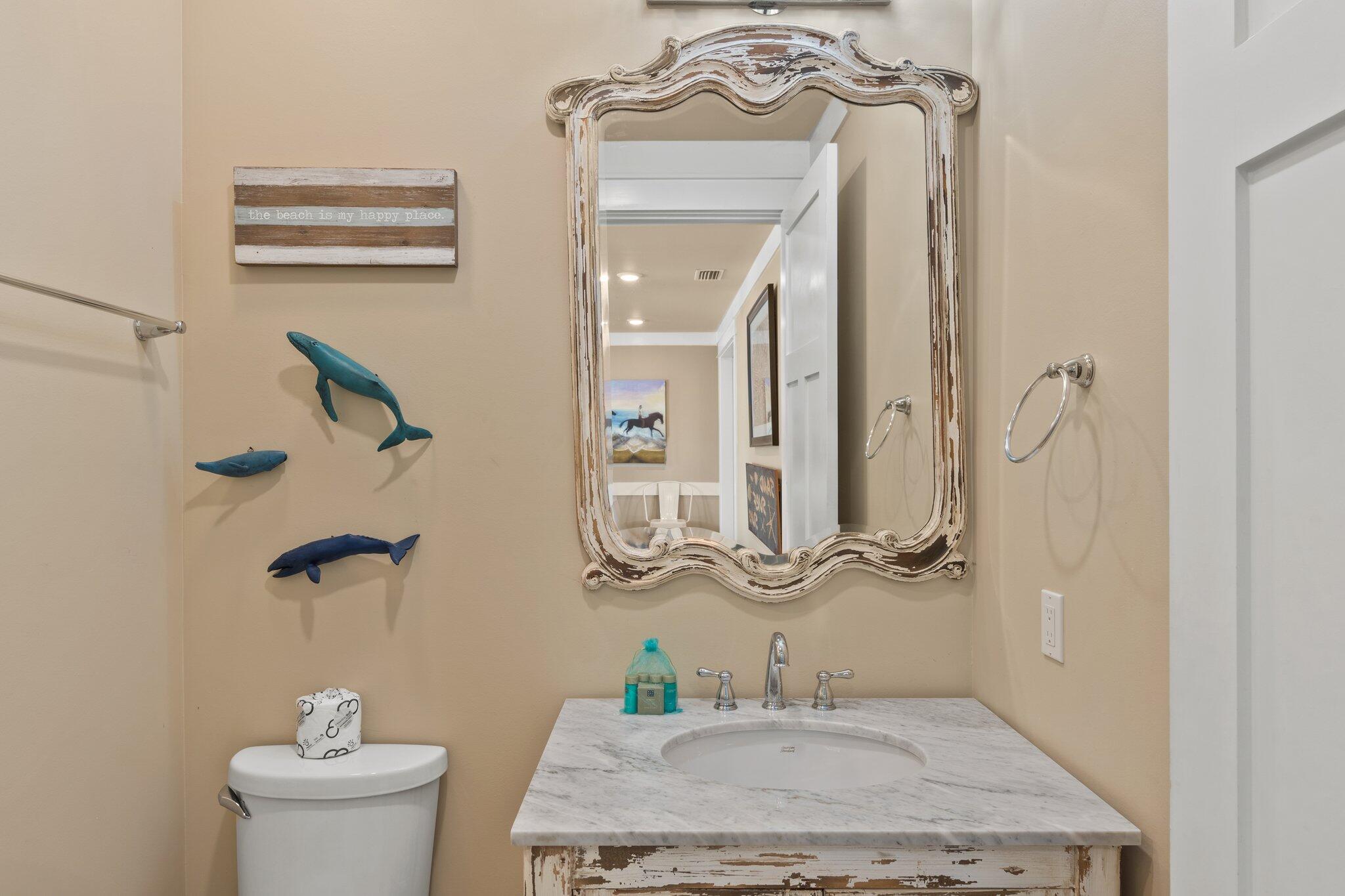 4478 Ocean View Drive Destin, FL 32541 - Photo 19 of 122 a bathroom with a granite countertop sink a toilet and a mirror