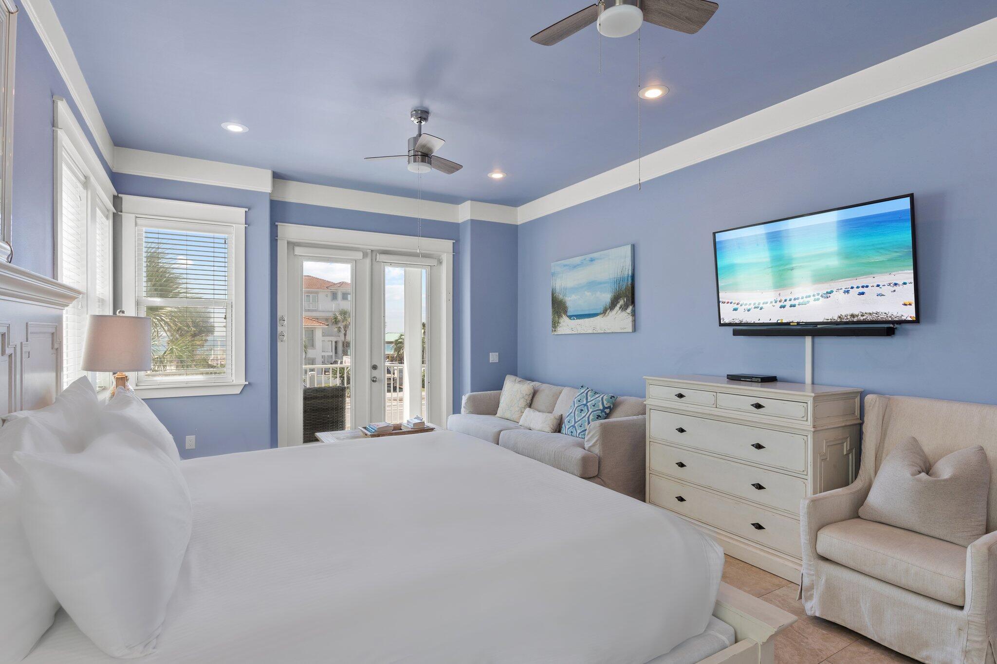 4478 Ocean View Drive Destin, FL 32541 - Photo 30 of 122 a bedroom with a large bed and a flat screen tv
