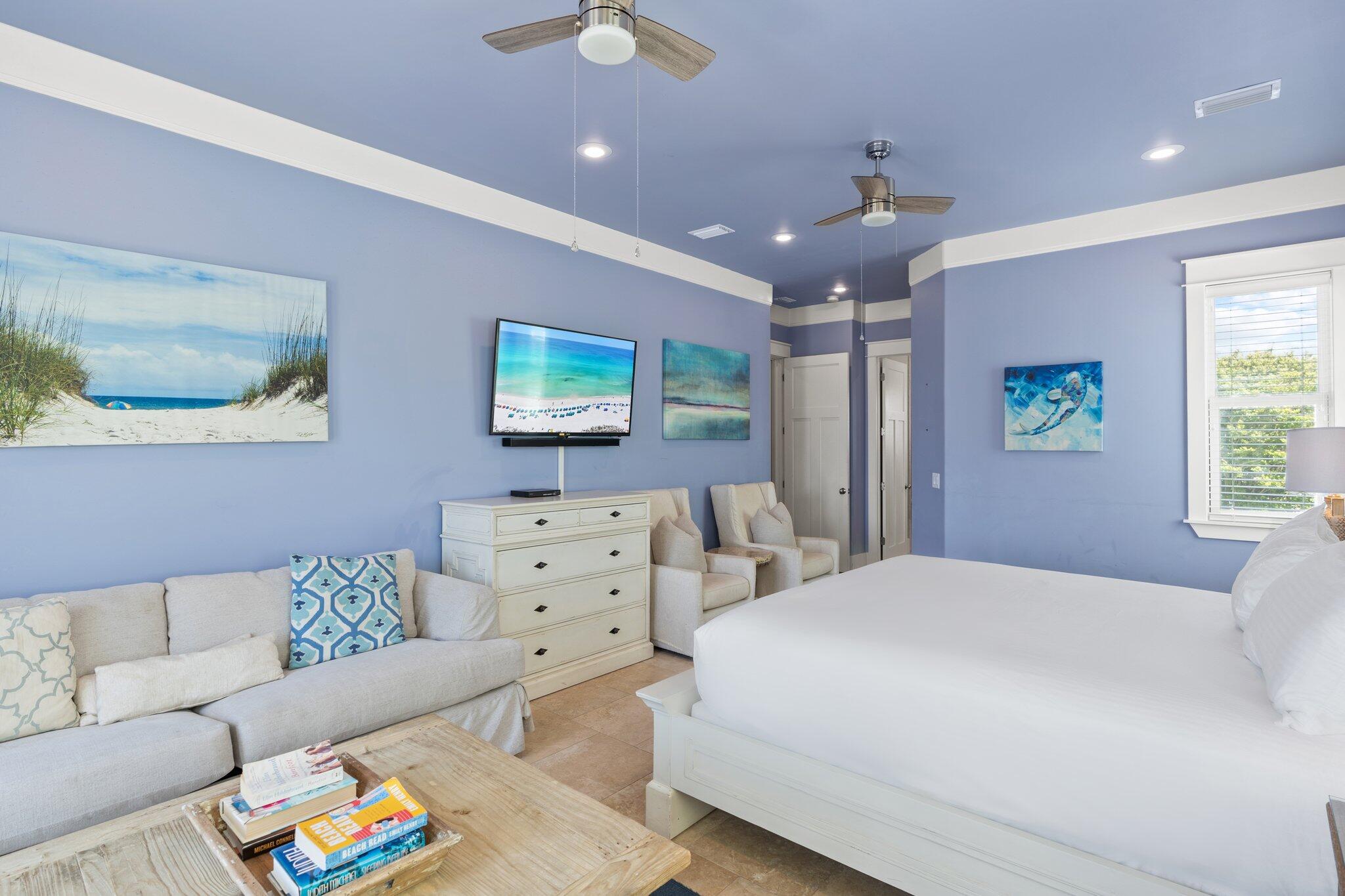 4478 Ocean View Drive Destin, FL 32541 - Photo 32 of 122 a spacious bedroom with a bed a couch and a window