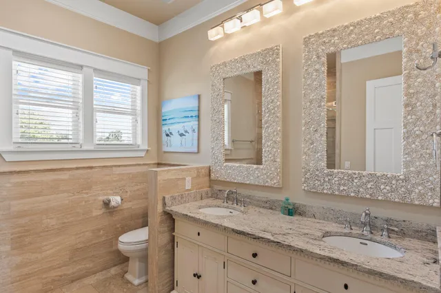 a spacious bedroom with a large bed and a large window